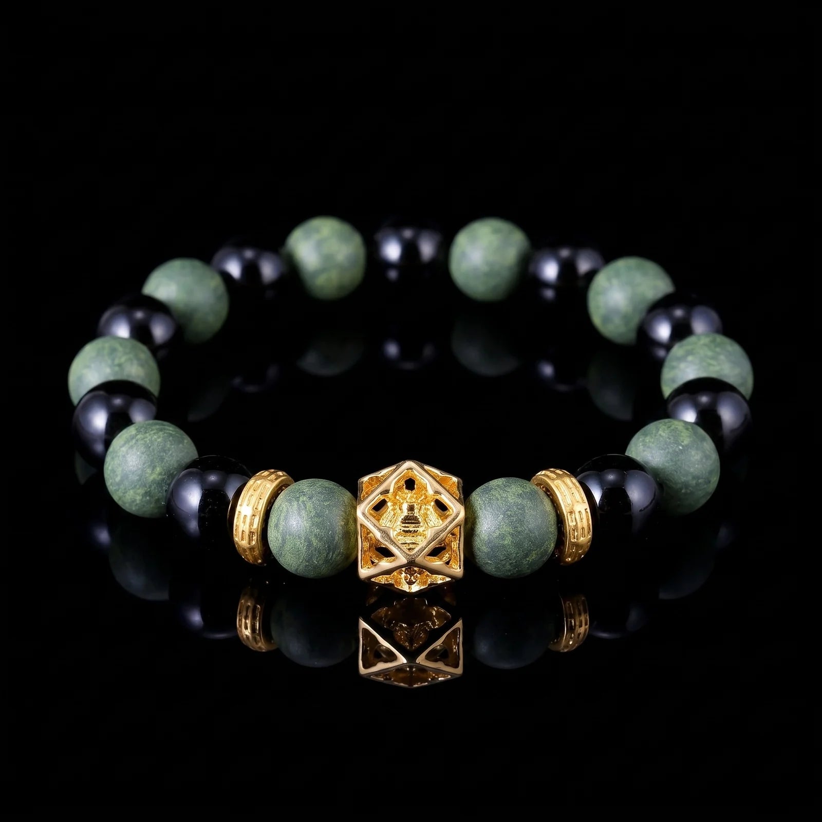 AZURE DRAGON Guardian Formula wearable incense bracelet with green and black beads on a black reflective surface.