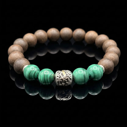 YONGZHENG COOL Imperial Accord wearable incense bracelet with green beads on a black reflective surface.