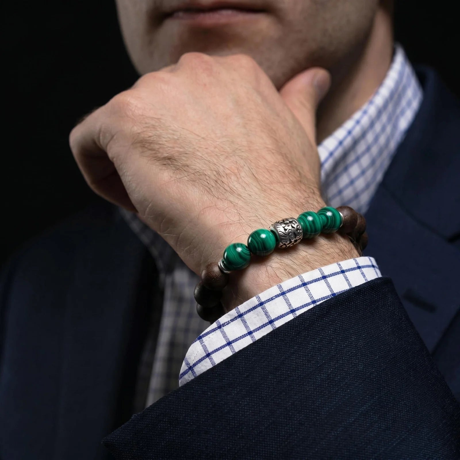 YONGZHENG COOL wearable incense bracelet worn with a navy suit for a refined men's styling.