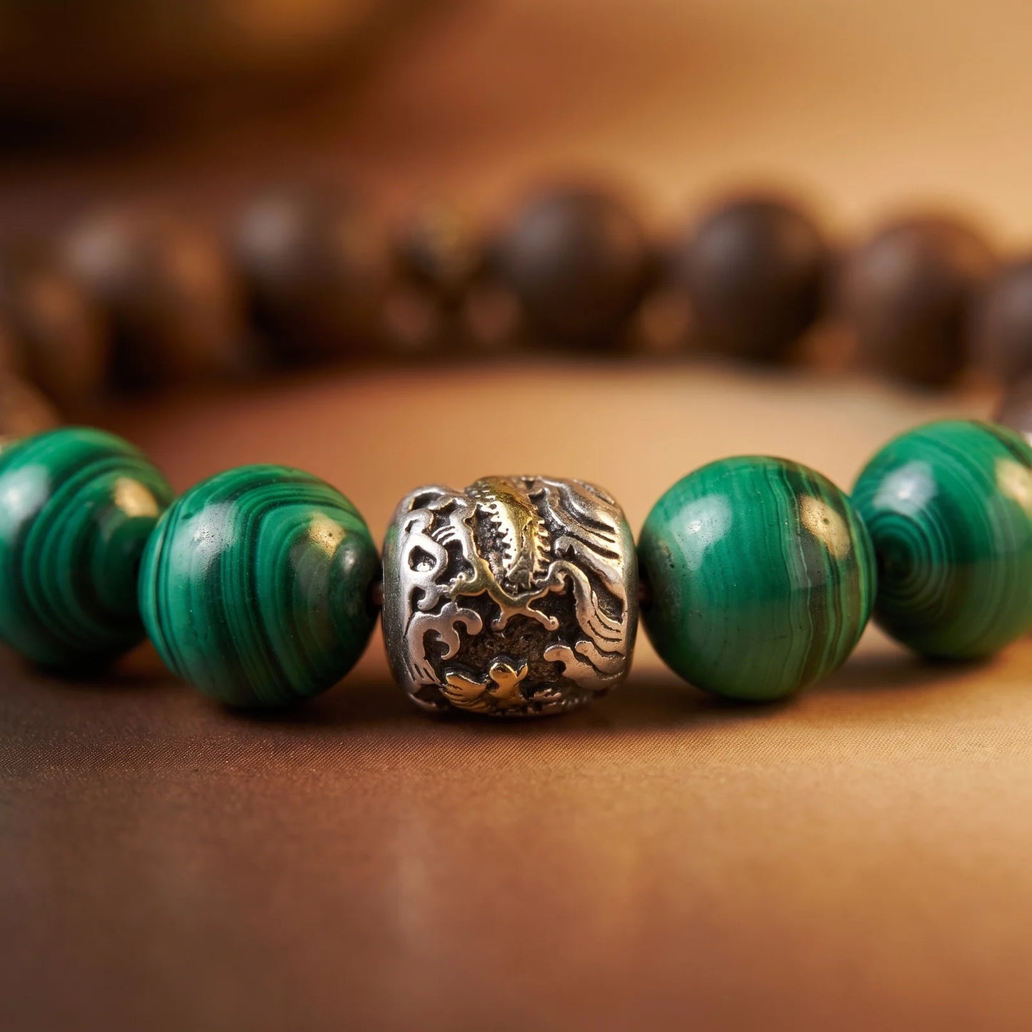 YONGZHENG COOL bracelet close-up showing green beads and a silver-toned dragon spacer.
