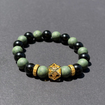 AZURE DRAGON wearable incense bracelet shown from an angled view on a clean gray surface.