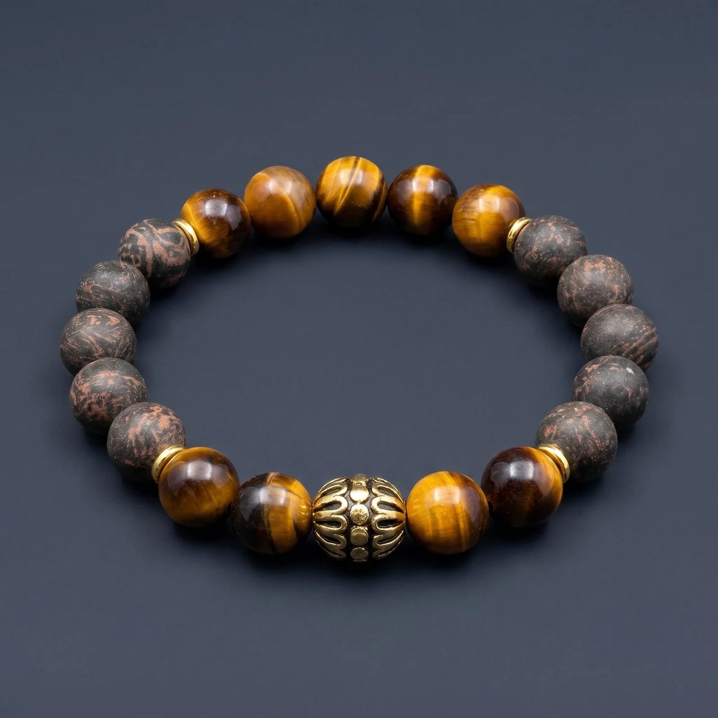 BLACK ACCORD Imperial wearable incense bracelet shown on a dark surface with warm tiger eye details.
