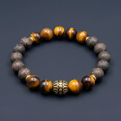 BLACK ACCORD Imperial wearable incense bracelet shown on a dark surface with warm tiger eye details.
