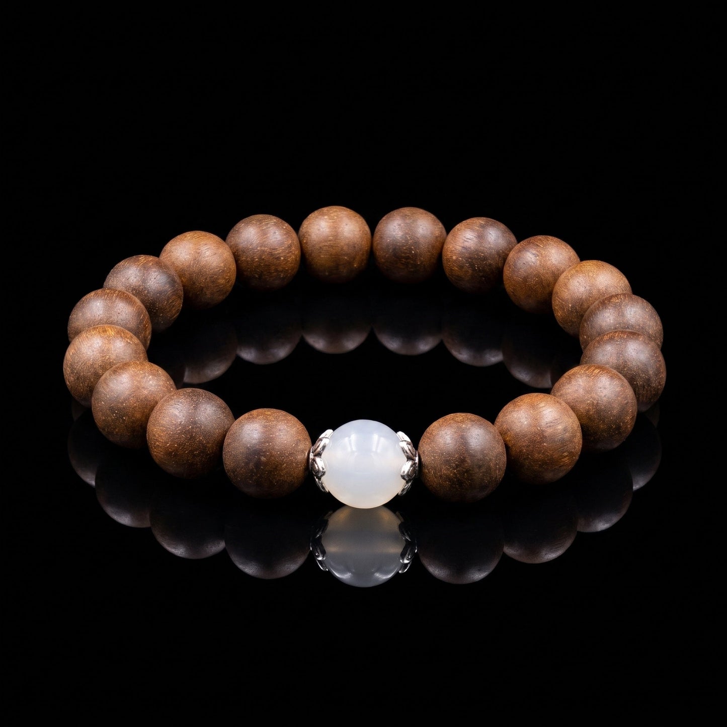 An Shen wearable incense bracelet on a black background