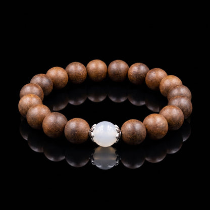 An Shen wearable incense bracelet on a black background