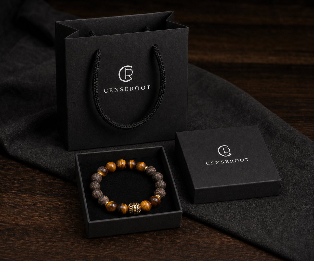 CENSEROOT Black Accord wearable incense bracelet fitted inside a matte black lift-off lid gift box with matching carrying bag